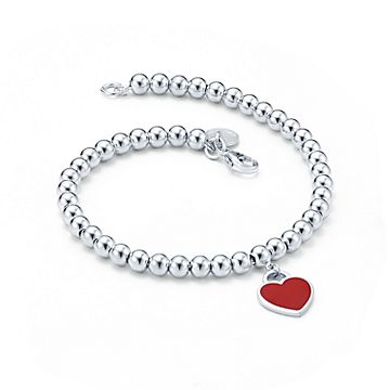 Return to tiffany mini heart tag sale in sterling silver on a bead bracelet