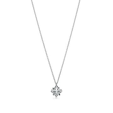 ブランデー chuckie Pendant in Gold and Platinum with an Amethyst, Diamonds and