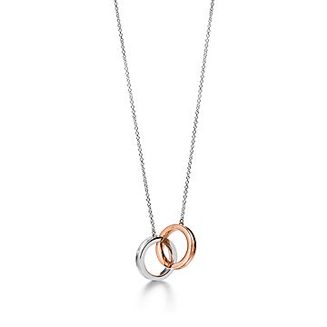 Tiffany 1837 interlocking circles pendant in sterling silver and 18k rose gold. Tiffany Co. US