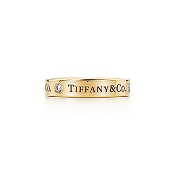 Argolla Tiffany Co. en oro de 18 quilates con diamantes de 4 mm. Tiffany Co