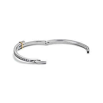 Tiffany Edge Hinged Bypass Bangle in Platinum and Yellow Gold with 