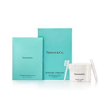 Tiffany Jewelry Care Kit with liquid jewelry cleaner, cloth, tweezers and  brush.