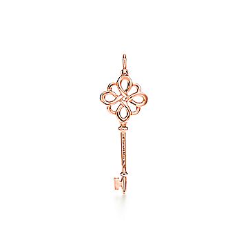 Tiffany Keys knot key pendant in 18k white gold with diamonds on a chain.