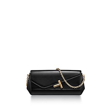 Tiffany T Clutch in Black Leather with a Chain Necklace