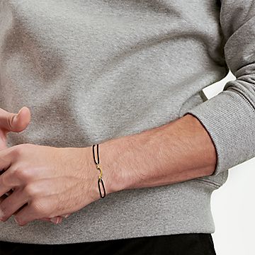 Tiffany T Smile Bracelet in Yellow Gold On A Black Cord Size Extra Small to Medium