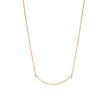 Tiffany T Smile Pendant in Yellow Gold, Small | Tiffany & Co.