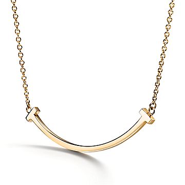 Tiffany T Smile Pendant in Yellow Gold, Small | Tiffany & Co.