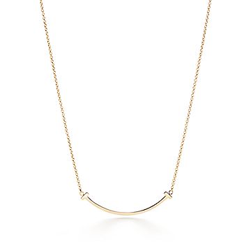 Tiffany T Smile Pendant in Yellow Gold, Small | Tiffany & Co.
