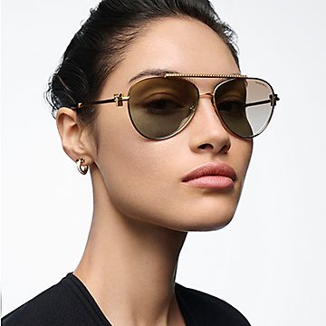 Tiffany & Co. ブラウンサングラス Tiffany T Sunglasses in Pale Gold-colored Metal with Brown