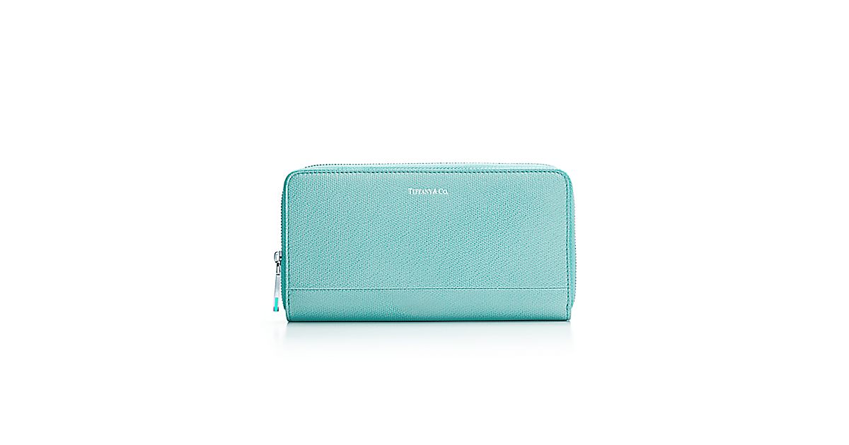 Continental zip wallet in light teal textured leather. More colors ...