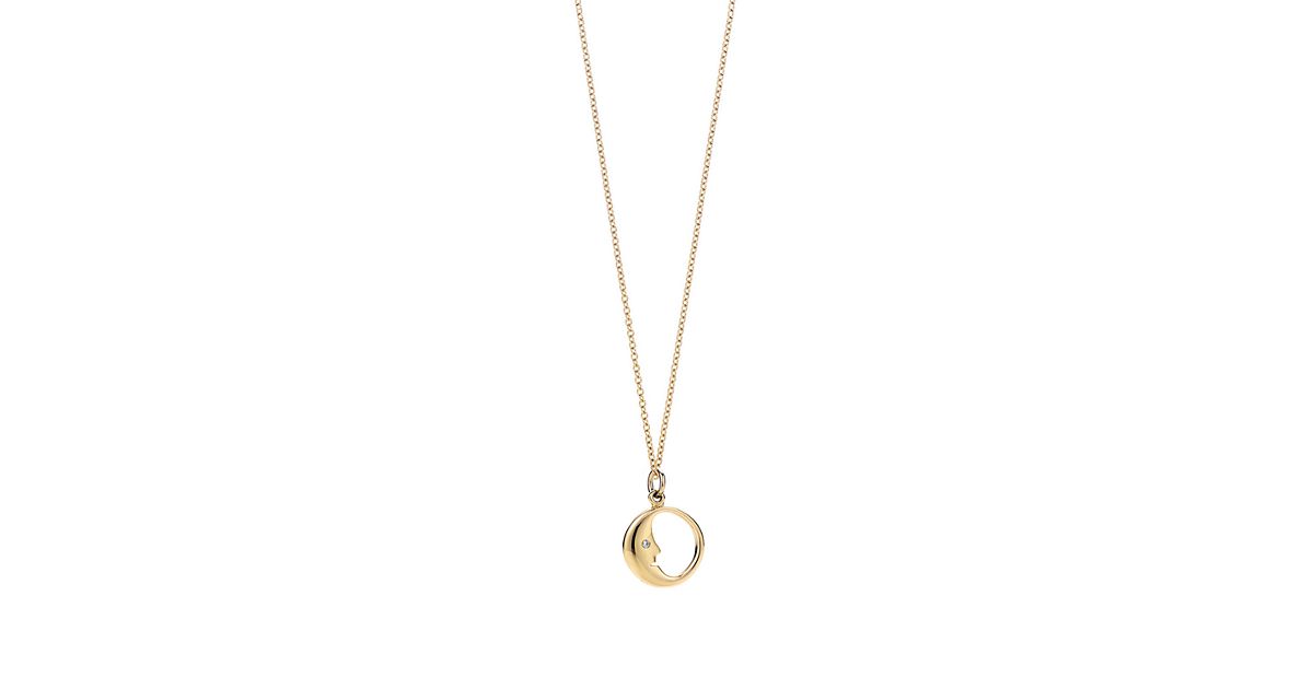 Man in the Moon charm. Diamonds, 18k gold. On a chain. | Tiffany & Co.