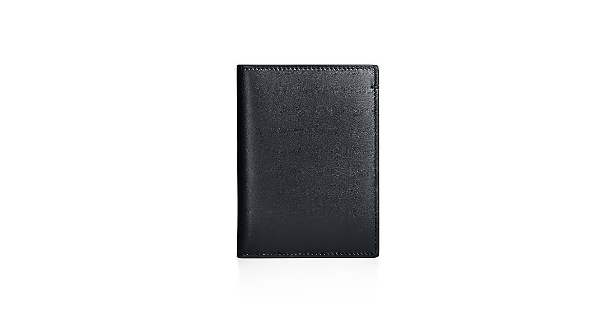 Passport cover in black smooth calfskin leather. | Tiffany & Co.
