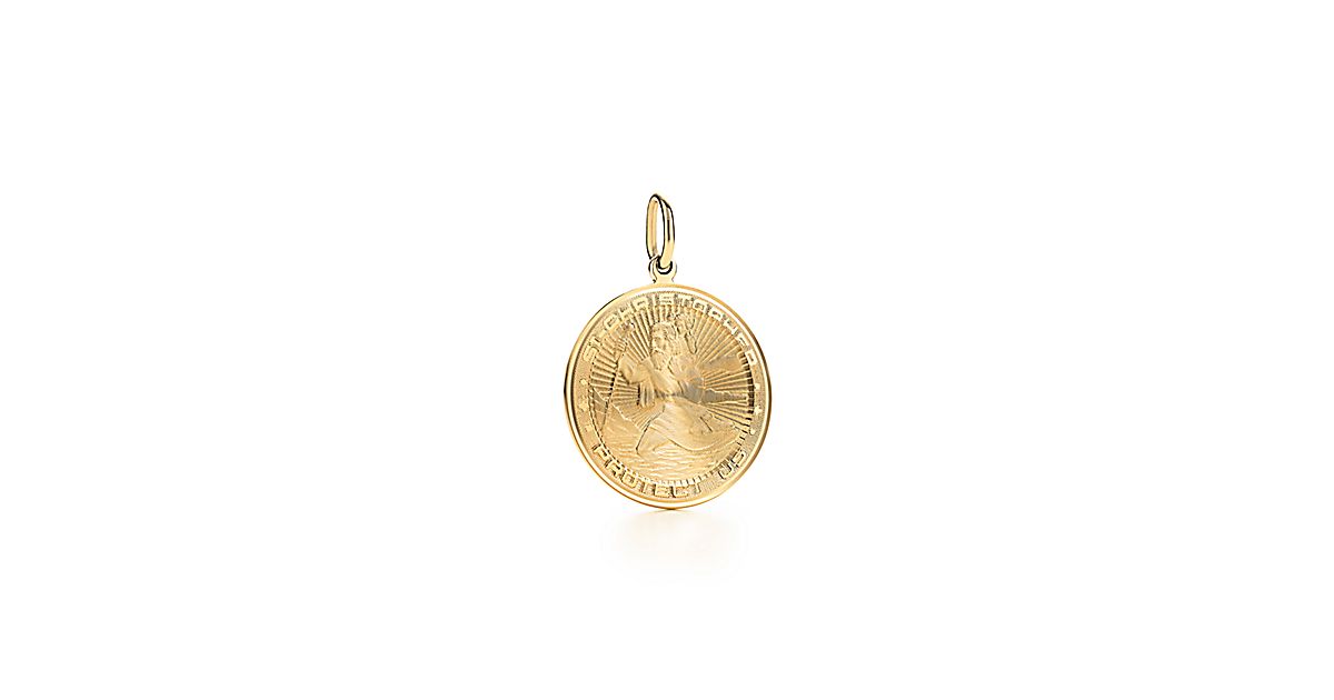 Saint Christopher charm in 18k gold. | Tiffany & Co.