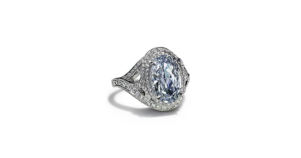 Wave ring in platinum with a 3.03-carat Fancy Intense Blue diamond ...