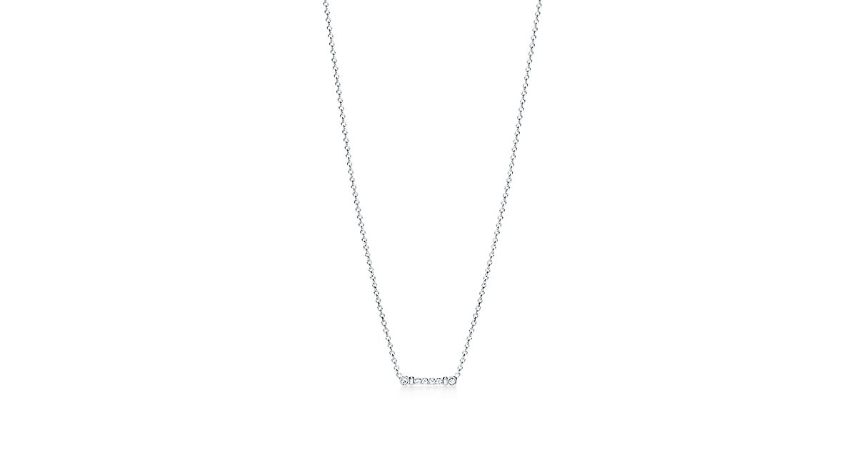 Tiffany Fleur de Lis key bar pendant in platinum with diamonds ...