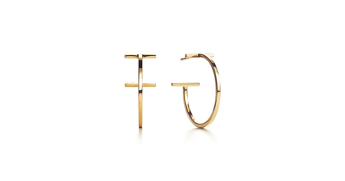 Tiffany T wire hoop earrings in 18k gold, medium. | Tiffany & Co.