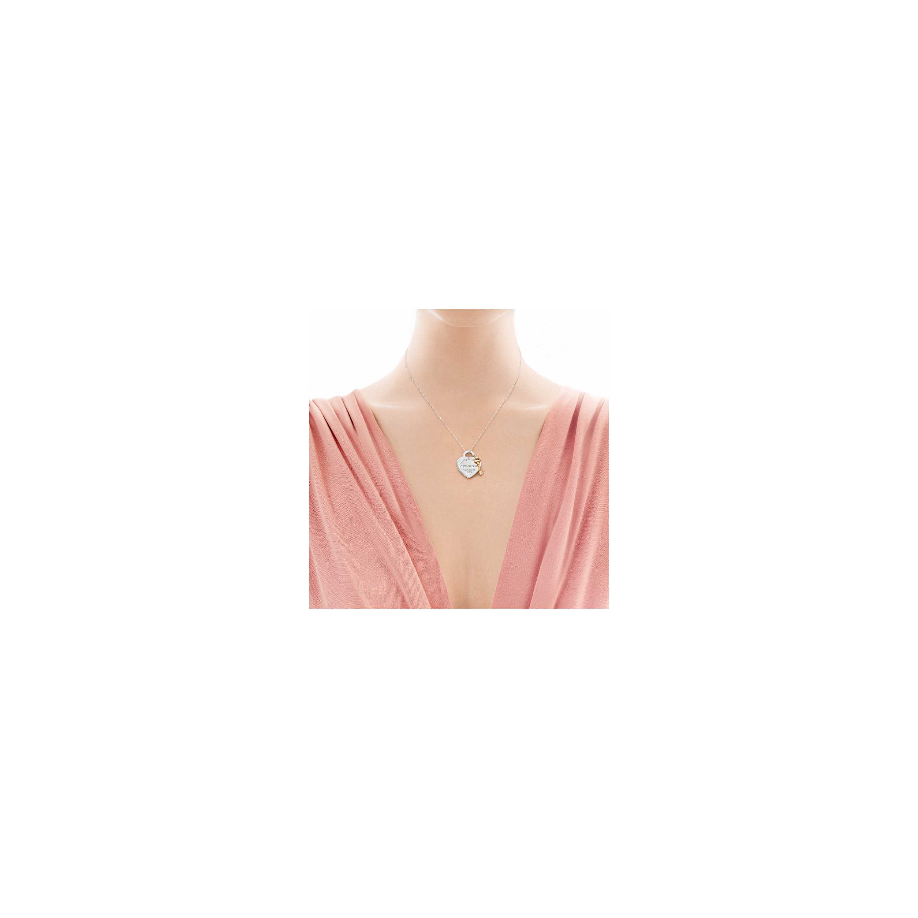 return to tiffany heart key pendant in silver and rubedo metal