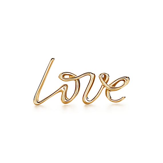 Paloma's Graffiti love single earring in 18k gold.