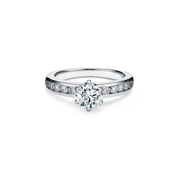  Engagement Ring with a Channel-set Diamond Band in Platinum