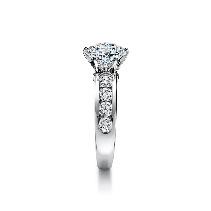 The Tiffany® Setting: Engagement Ring with a Channel-set Diamond Band in Platinum, 4
