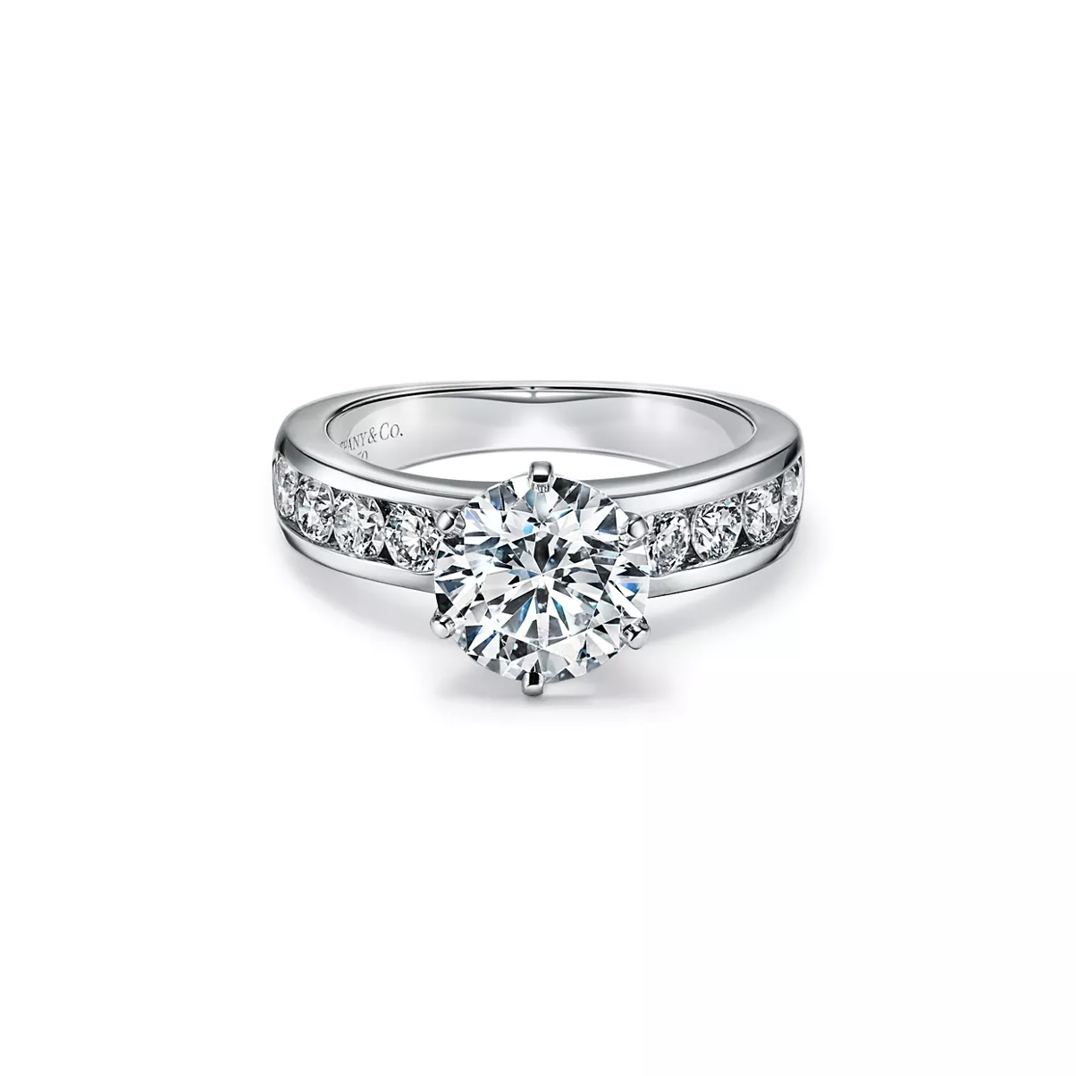  Engagement Ring with a Channel-set Diamond Band in Platinum