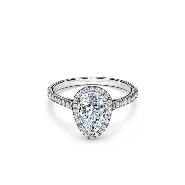 Pear-shaped Halo Engagement Ring with a Diamond Platinum Band