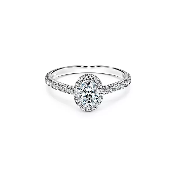  Oval Halo Engagement Ring with a Diamond Platinum Band