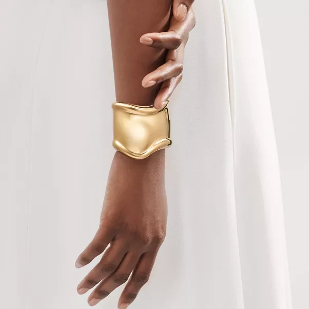 Brazalete Bone mediano en oro de 18 quilates
