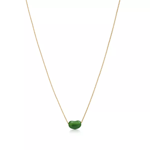 Pendentif Bean design en or jaune 18 carats et jade vert. 9 mm.