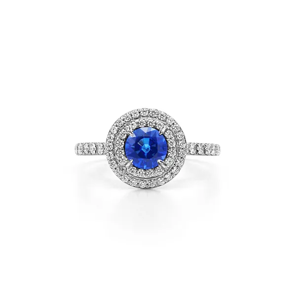 Ring   in Platinum with a Sapphire and Diamonds