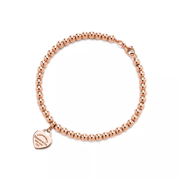Bracelet de perles Plaque Cœur en or rose 18 carats. 4 mm.