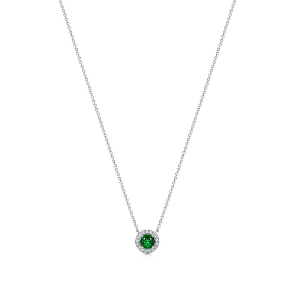 Colgante de platino con una esmeralda y diamantes