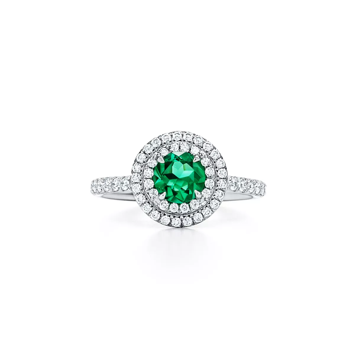 Ring in Platinum with an Emerald and Diamonds