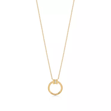 Tiffany T:Diamond Pendant in Gold with a Baguette Diamond, 2