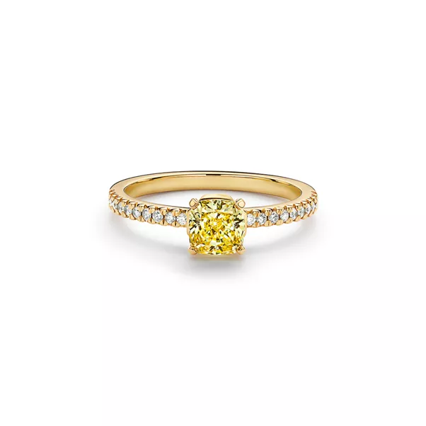 Engagement Ring with a Cushion-cut Yellow Diamond and an 18k Yellow Gold Diamond Band