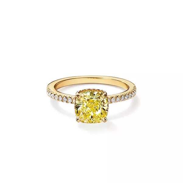 Engagement Ring with a Cushion-cut Yellow Diamond and an 18k Yellow Gold Diamond Band