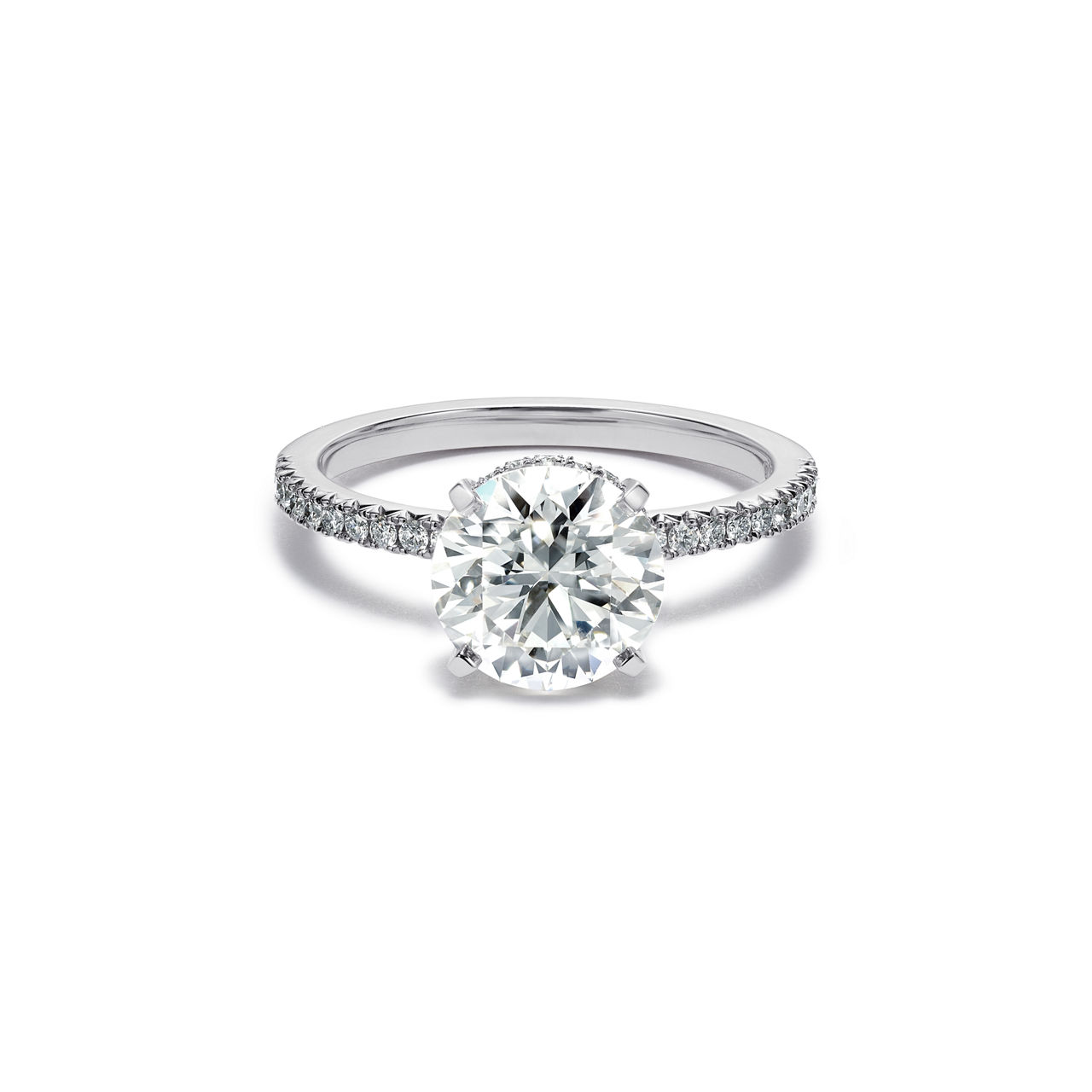 Engagement Ring with a Round Brilliant Diamond and a Platinum Diamond Band
