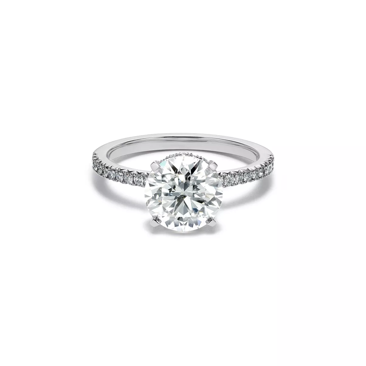 Engagement Ring with a Round Brilliant Diamond and a Platinum Diamond Band
