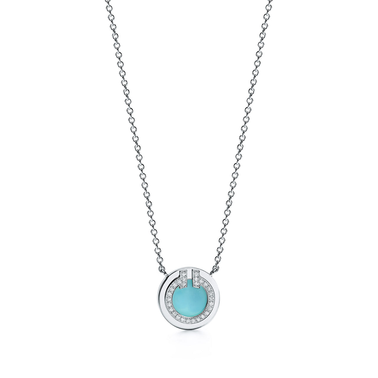 Colgante circular de diamantes y turquesa de oro blanco