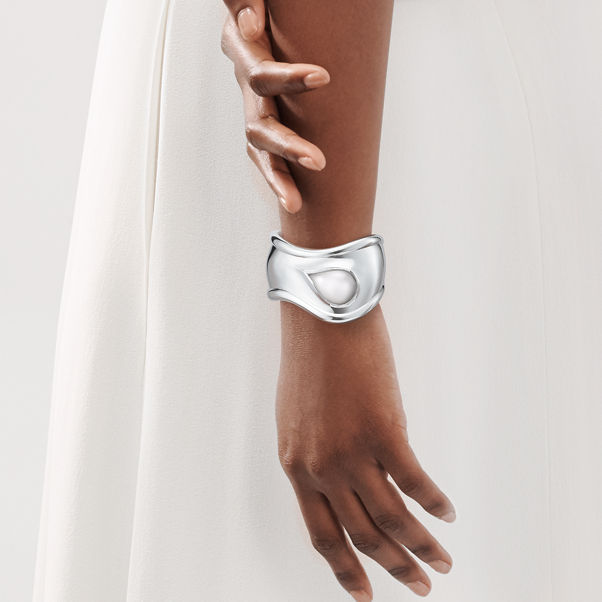 Elsa Peretti®:Small Bone Cuff in Sterling Silver with White Jade