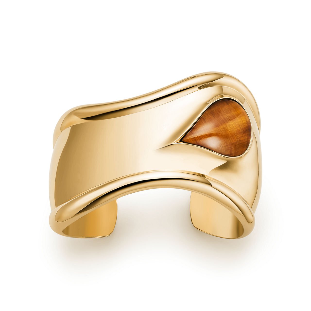 Elsa Peretti®:Small Bone Cuff in Yellow Gold with Tiger's Eye image number 0