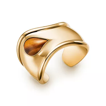Elsa Peretti®:Small Bone Cuff in Yellow Gold with Tiger's Eye, 2