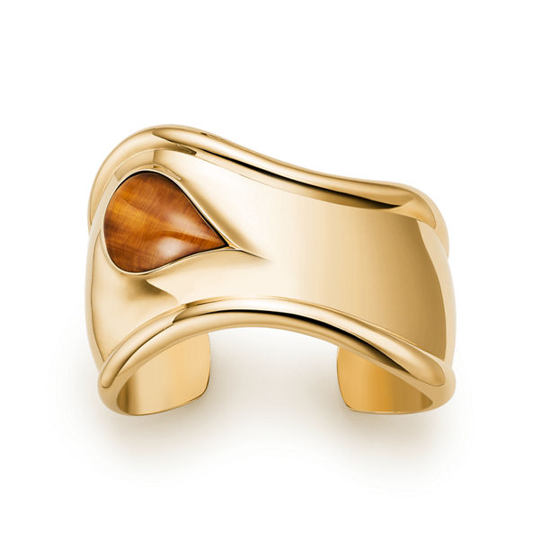 Elsa Peretti®:Small Bone Cuff in Yellow Gold with Tiger's Eye