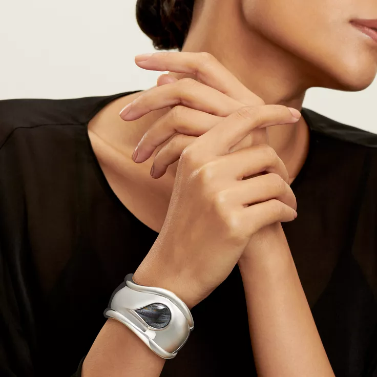 Elsa Peretti®:Small Bone Cuff in Silver with Tiger Iron, 1