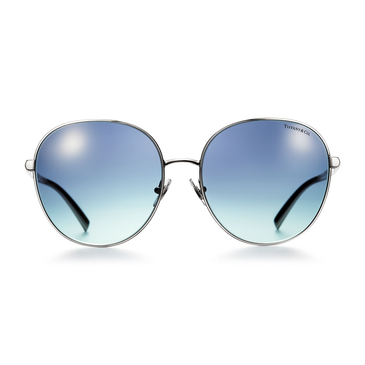 Gafas de sol redondas en metal plateado