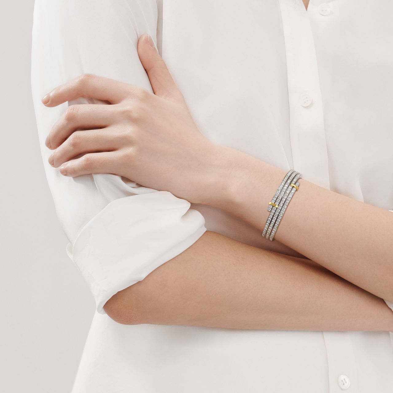 Multi-row Bypass Bracelet in Platinum and Yellow Gold with Diamonds