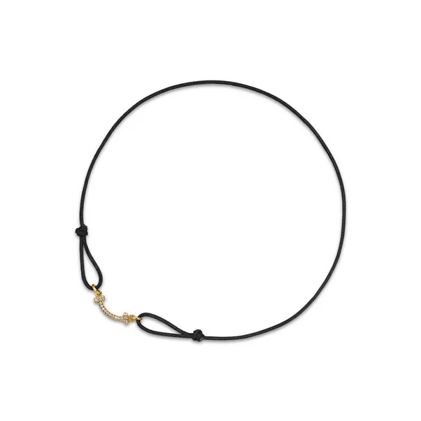 Pulsera Smile de oro amarillo en un cord&oacute;n de color negro con diamantes