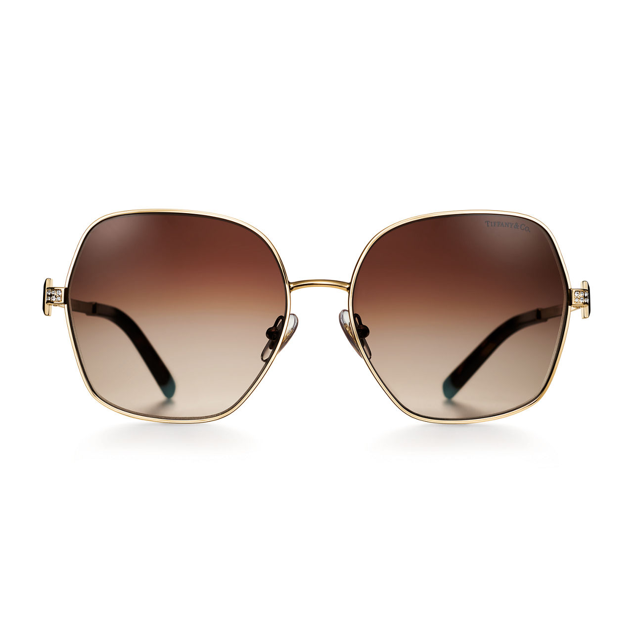 Gafas de sol en metal dorado claro con cristales en marrón degradado