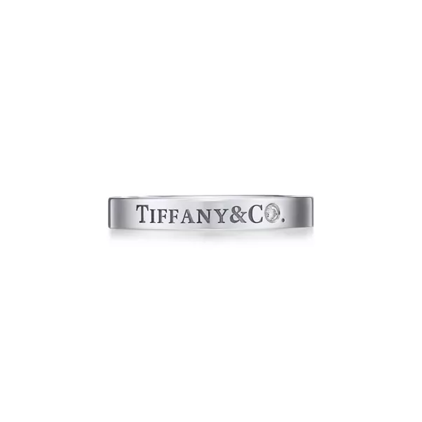 Band Ring in Platinum with a Diamond