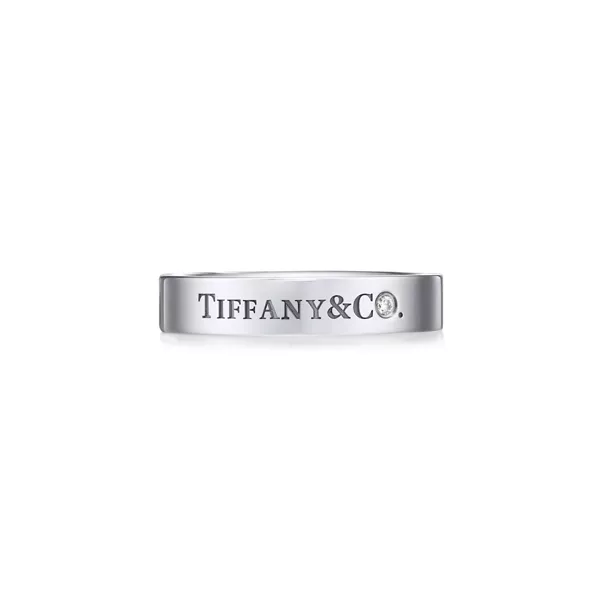 Band Ring in Platinum with a Diamond
